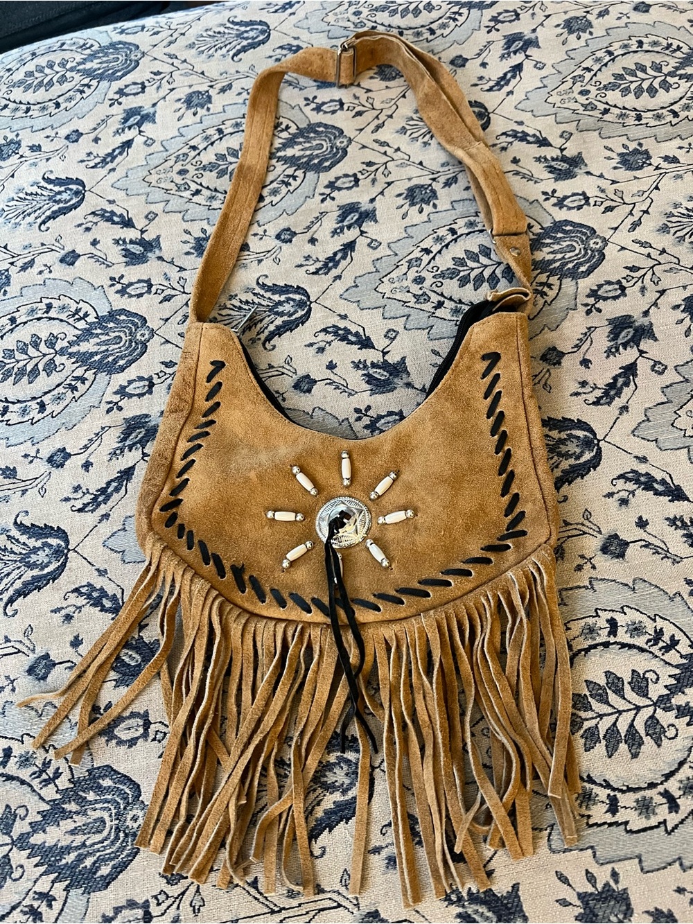 Western style tan suede crossbody bag